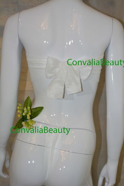 Бюстгалтер одноразовий (білий), м`який, на зав`язках, 50шт ТМ Convalia Beauty 2011 фото
